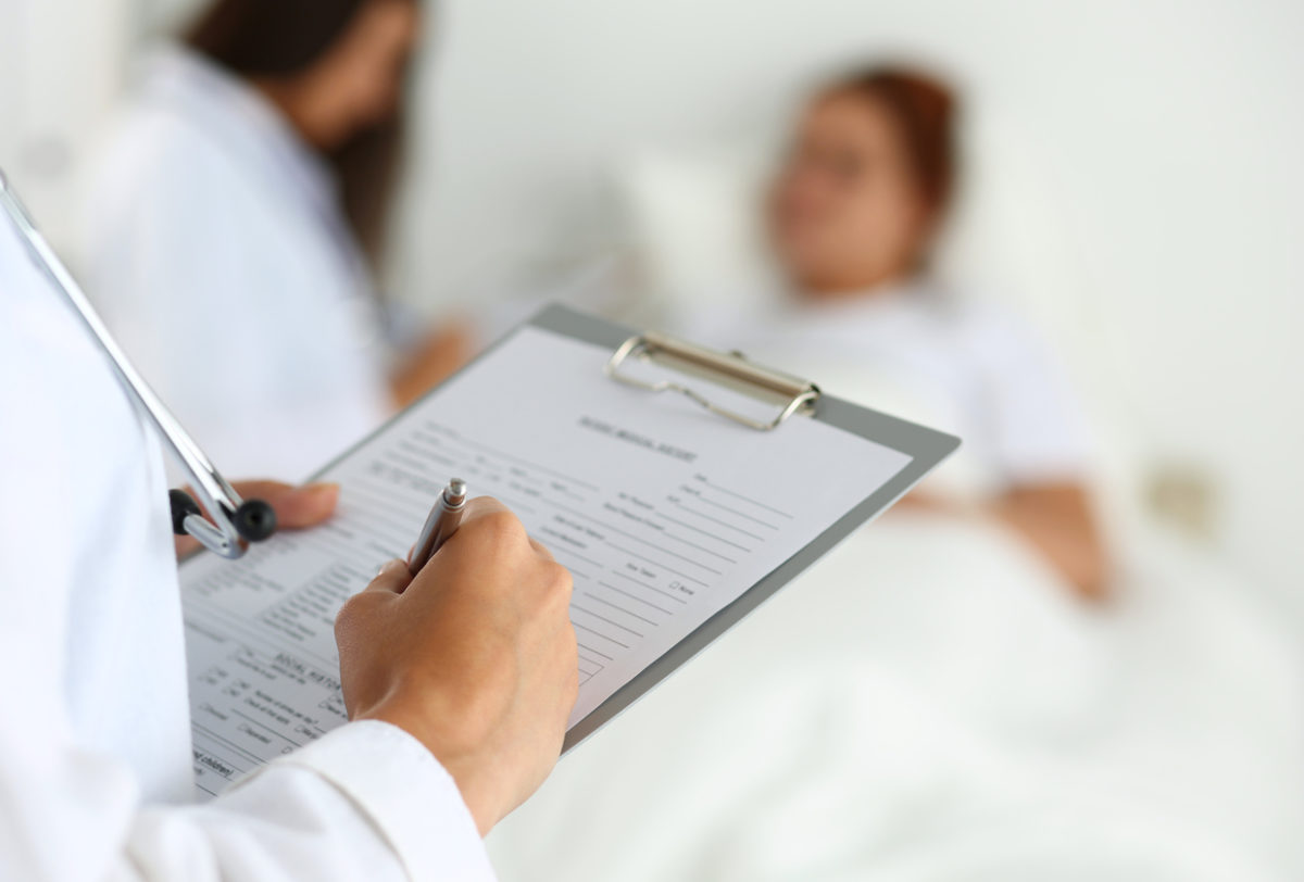 Nursing student on clinical round.