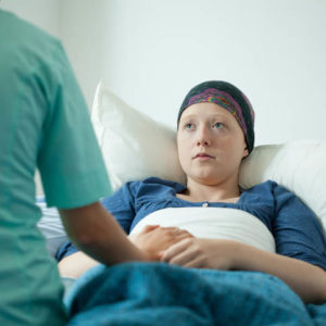 oncology nurse with patient