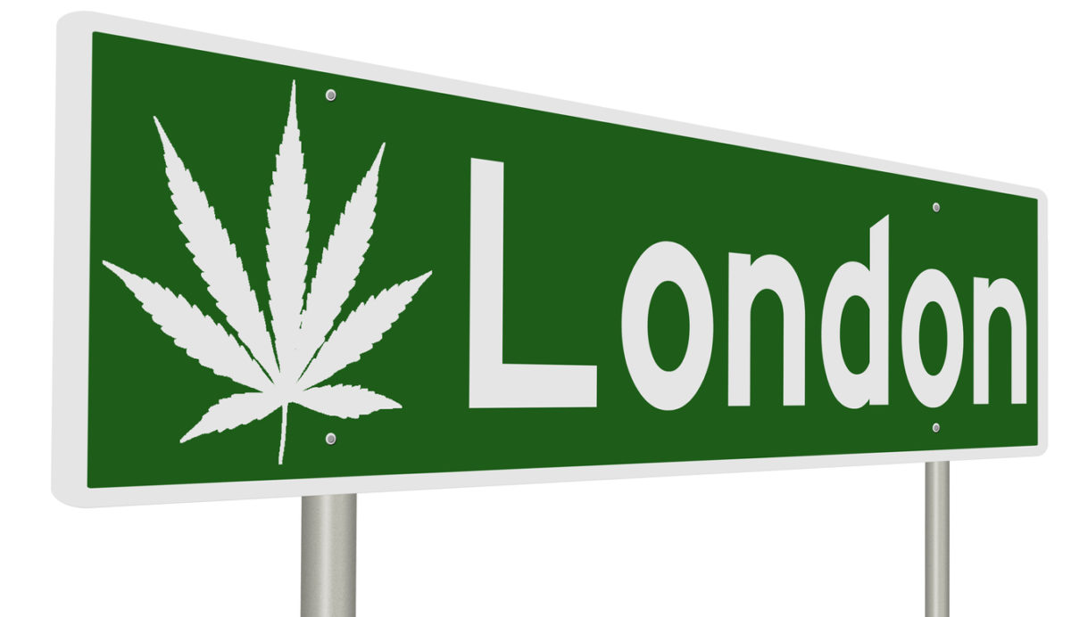 The NHS has finally approved the use of two cannabis-derived medications in the UK. "London" road sign with cannabis leaf.