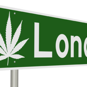 The NHS has finally approved the use of two cannabis-derived medications in the UK. "London" road sign with cannabis leaf.