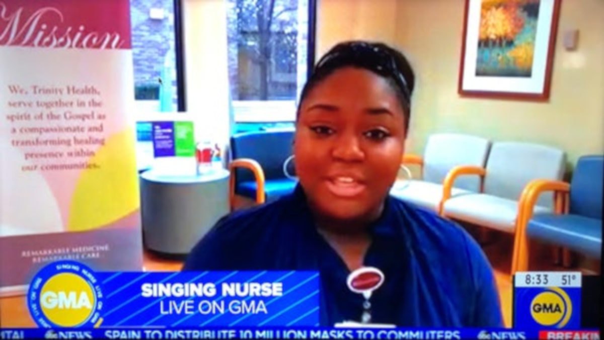 RN Lori Marie Kay belted out "Amazing Grace" during a shift change.