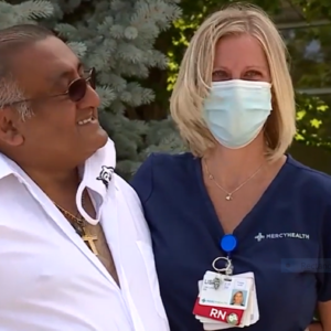 Ohio nurse Lisa Lane and COVID survivor Walter Ruiz.