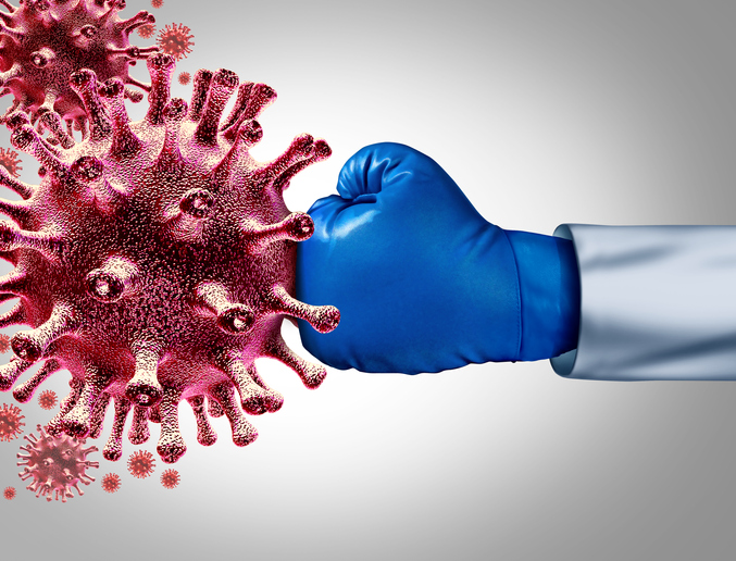 Fist punching COVID-19 virus.