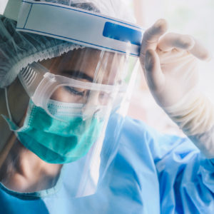 Nurse in PPE on Covid frontlines.