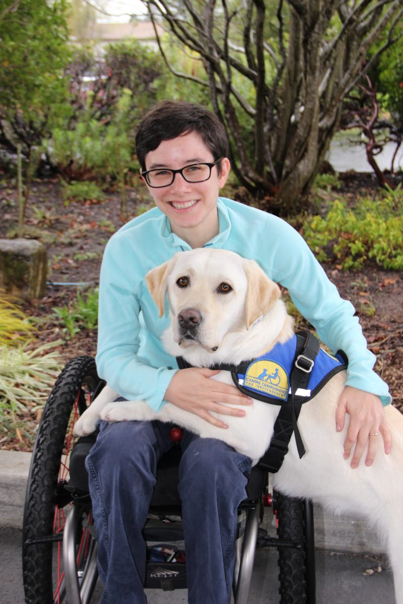 Wallis Brozman and her service dog Renata Photo by Chris Kitteredge Photography