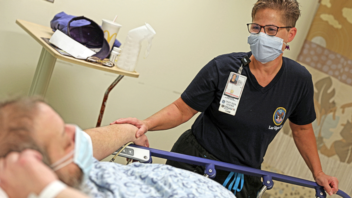VA nurse MariaVanHart with patient.