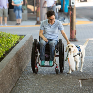 Wallis Brozman and her service dog Renata Photo by Chris Kitteredge Photography
