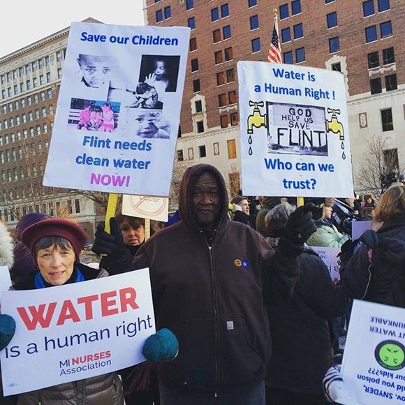 Residents protesting during Flint water crisis.