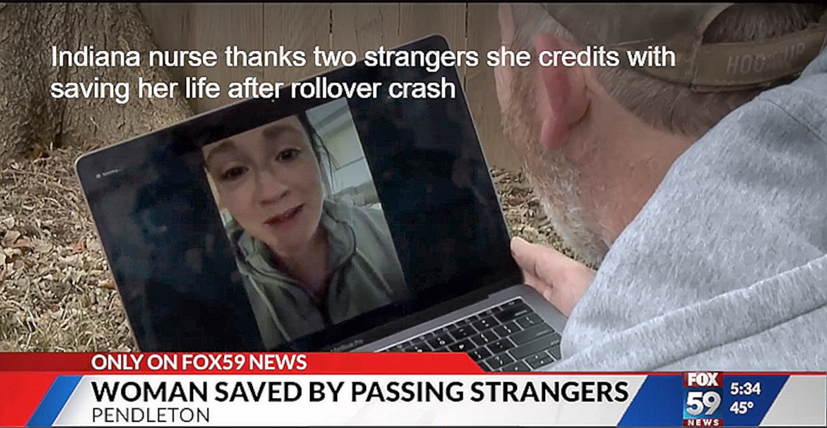Nurse Ericka Cosby talks to rescuer Robert Wilson.