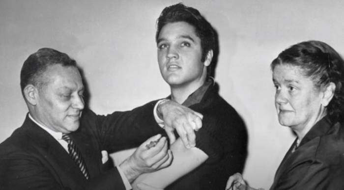Elvis Presley, receiving his polio vaccination in 1956.