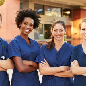 Nurses gathered outside hospital.