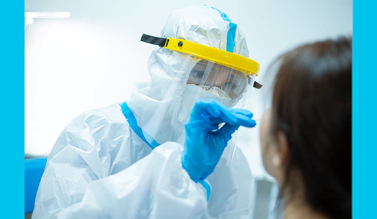Nurse in full PPE (personal protective equipment) gear..