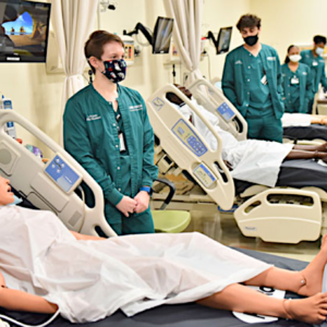 UAB nursing students work with a simulation.