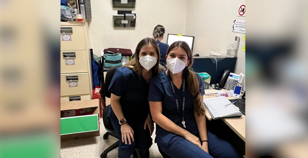 RN Megan Hand with fellow mentor.