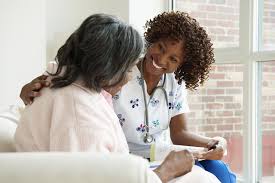 a hospice nurse with a patient