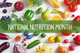 photo of colorful fruits and vegetables with National Nutrition Month across